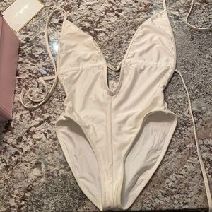 American apparel white one-piece bathing suit.